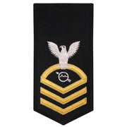 Navy E7 FEMALE Rating Badge: OS Operations Specialist - seaworthy gold on blue