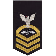 Navy E7 MALE Rating Badge: Aviation Electronics Technician - seaworthy gold on blue