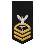 Navy E7 FEMALE Rating Badge: HM Hospitalman - seaworthy gold on blue