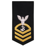 Navy E7 FEMALE Rating Badge: NC Navy Counselor - seaworthy gold on blue
