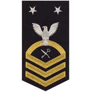 Navy E9 MALE Rating Badge: Retail Services Specialist - seaworthy gold on blue