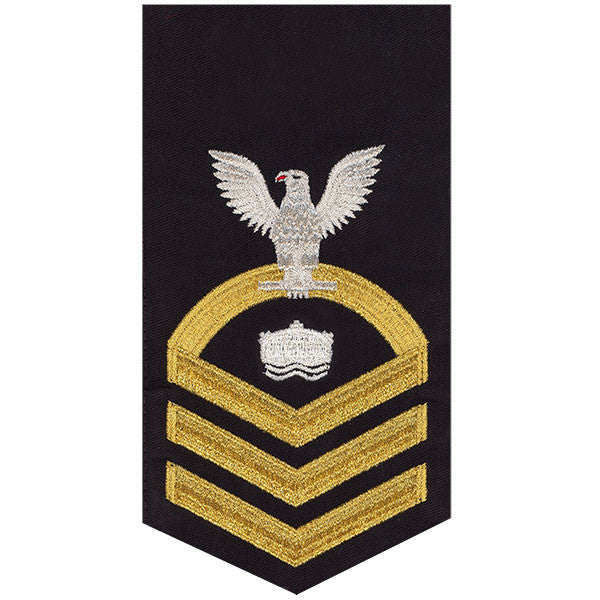 Navy E7 MALE Rating Badge: Mineman - seaworthy gold on blue