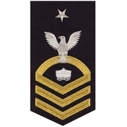 Navy E8 MALE Rating Badge: Mineman - seaworthy gold on blue