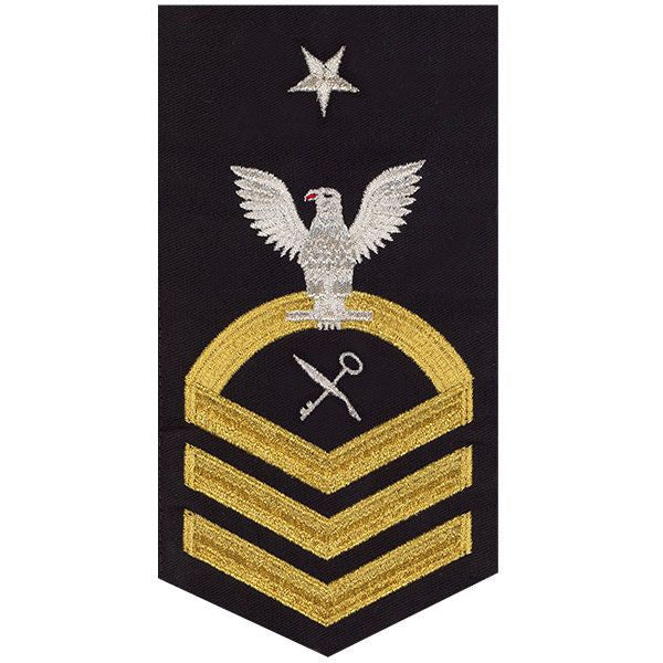 Navy E8 MALE Rating Badge: Retail Services Specialist - seaworthy gold on blue