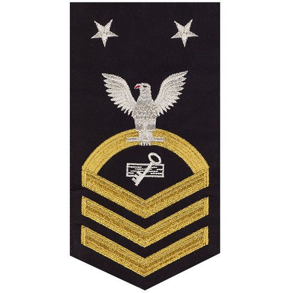 Navy E9 MALE Rating Badge: Disbursing Clerk - seaworthy gold on blue